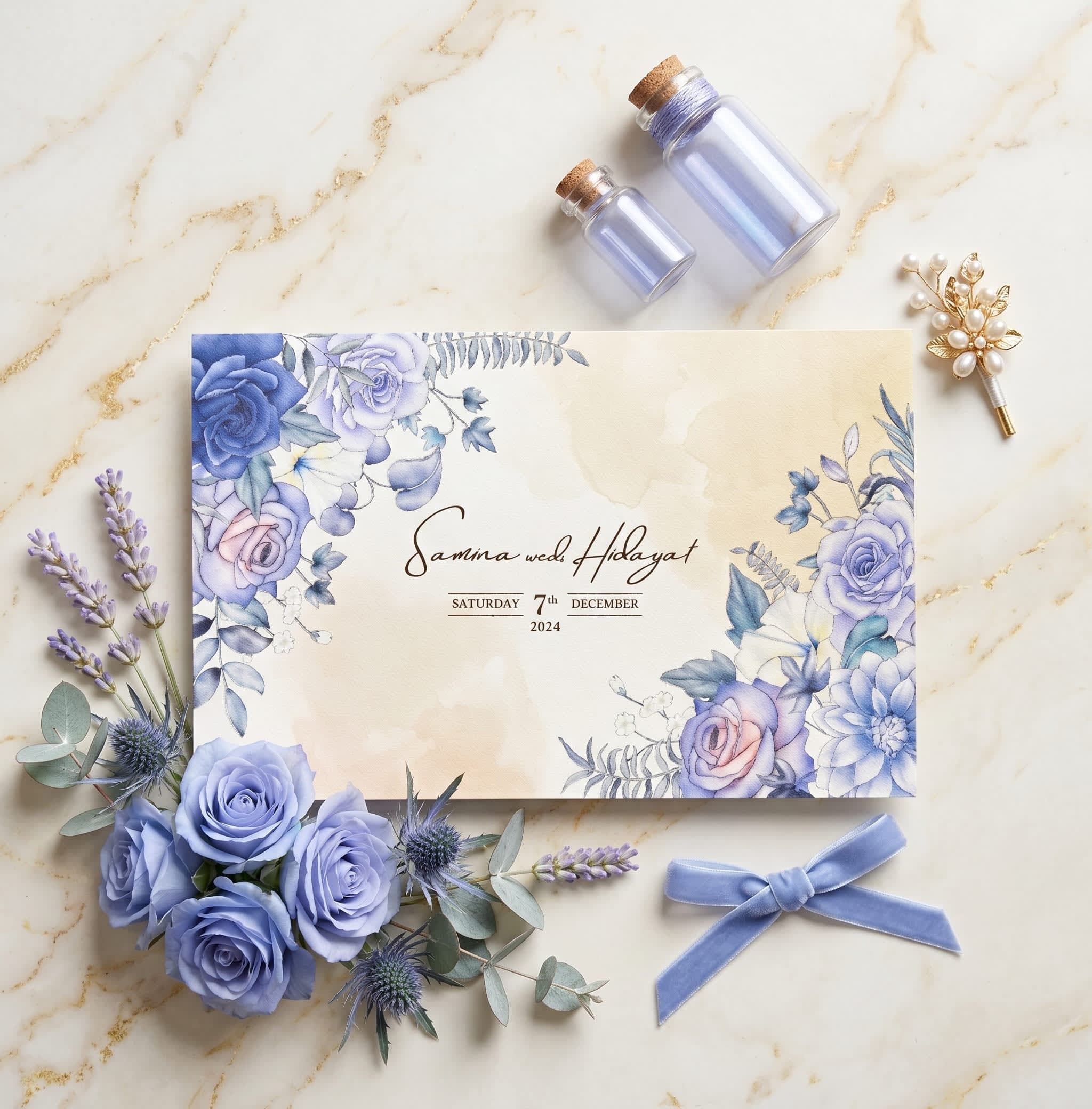 Landscape wedding card with dusty-blue and cream watercolour flowers in the corners and brown script by Shahi Bulawa Karachi